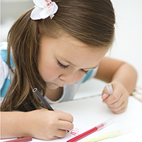 preschool girl writing